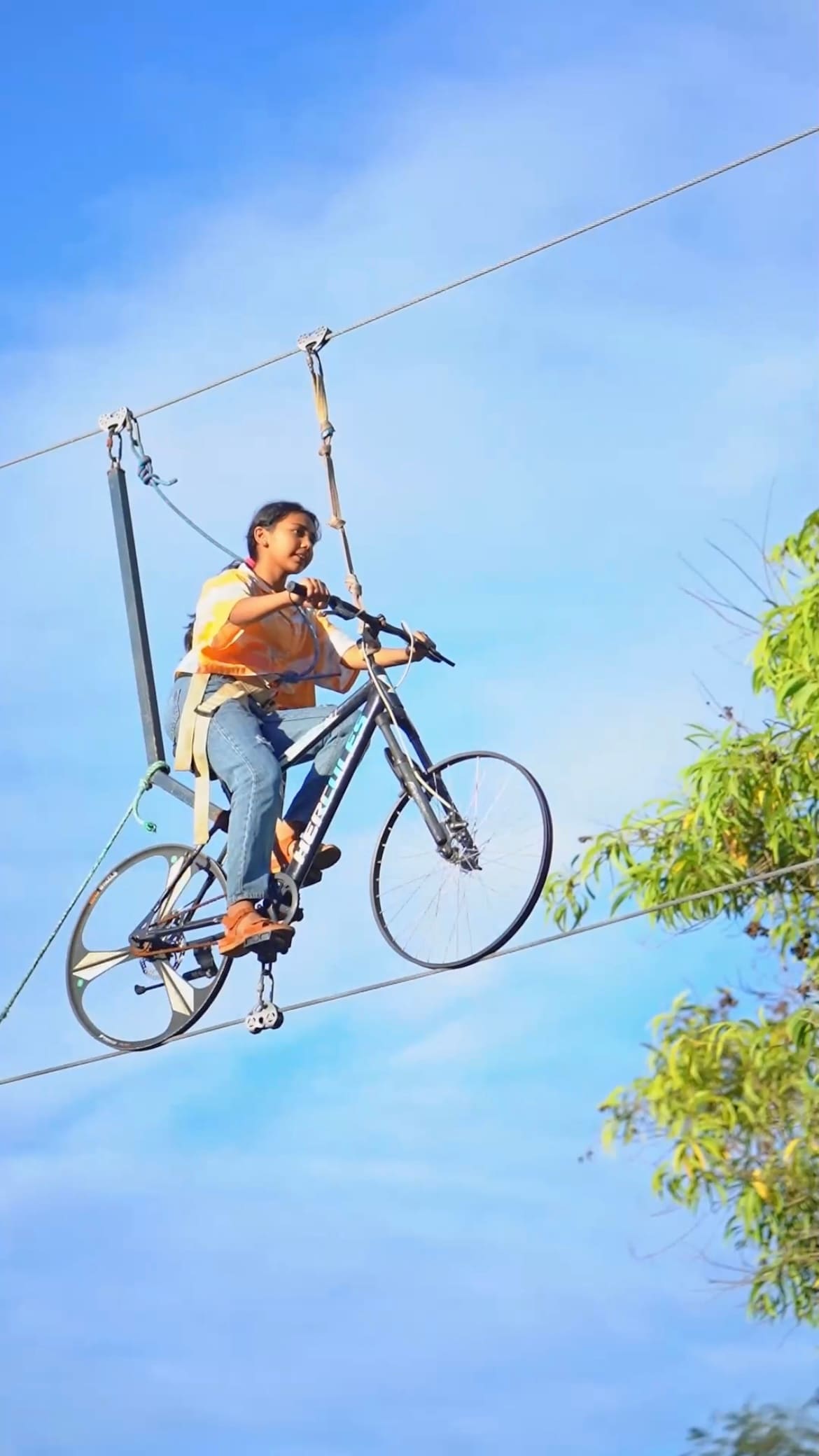 Sky cycling on the high wire above the adventure zone