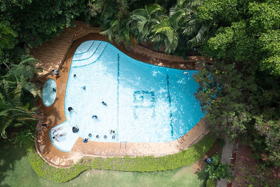 The freeform family pool with slides, seen from above